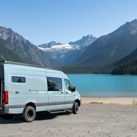 Sprinter van equipped with running boards, perfect for Vanlife trips and adventures.
