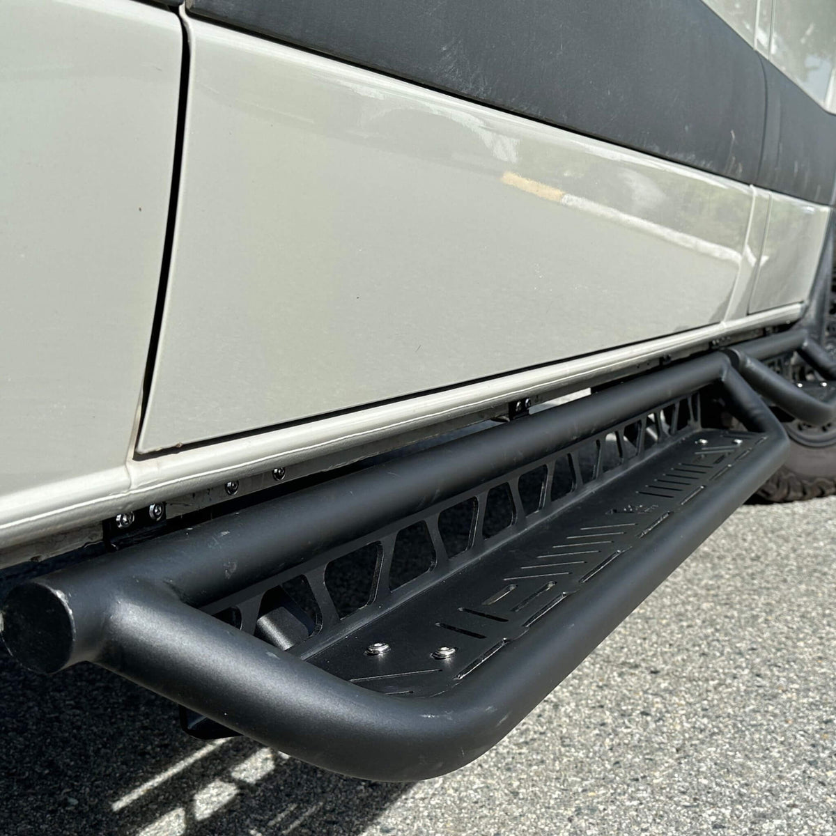 Running boards highlighting rugged, stylish design suitable for adventure-ready Sprinter vans.