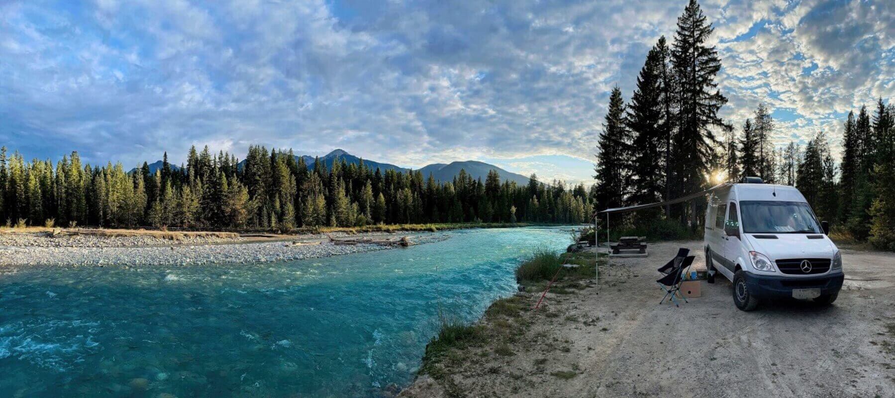 Lonavity van conversion, rental and products, travelling in British Columbia, parked by the river beautiful sunrise in BC living the Vanlife