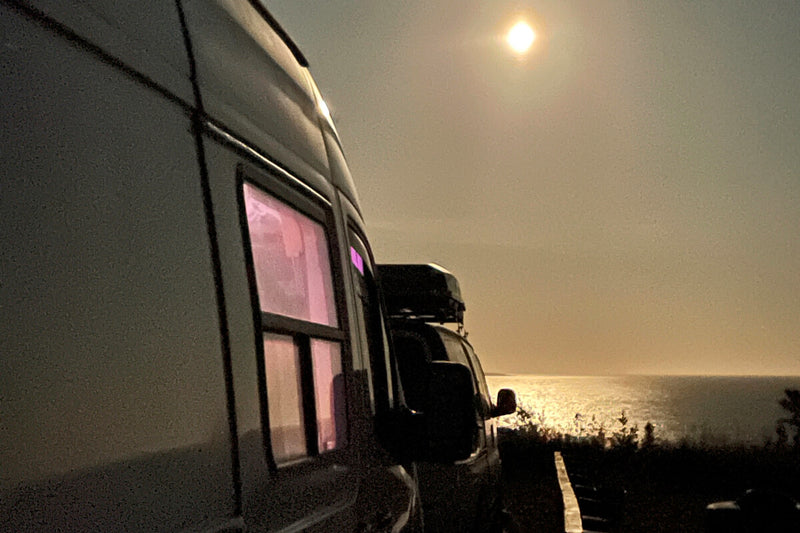 Lonavity van conversion, travelling to Havre-Saint-Pierre in Quebec. A beautiful view of the moon reflecting the water, rent the van for the weekend to explore Canada