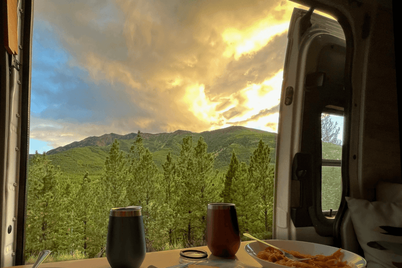 Lonavity, view of the BC mountains, eating spaghetti and watching the sunset from our custom van conversion.png