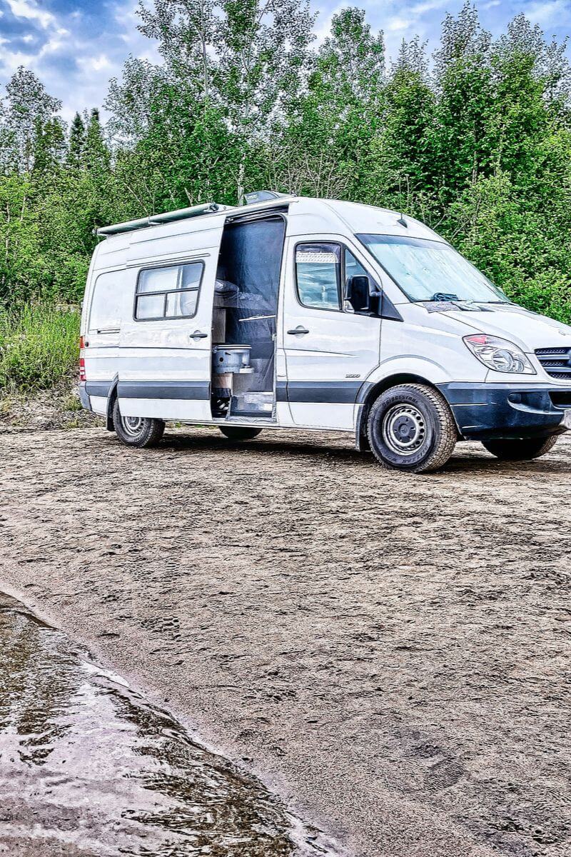 Lonavity van by the beach at Lac Petit Bras, Baie-Comeau, with homemade curtains and mosquito mesh