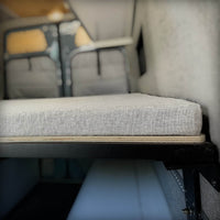 adjustable height panel bed system for van conversion interior