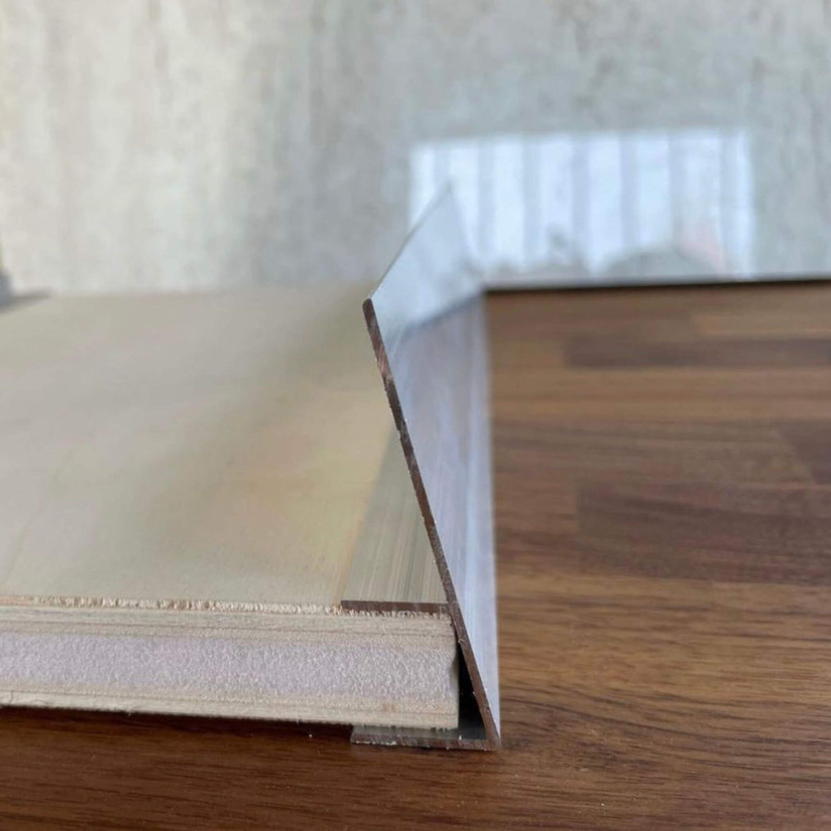 Detailed view showing smooth finish of aluminum corner for van cabinets.