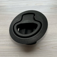 Black dual-spring cabinet latch for vans, durable and reliable for secure storage on the road.