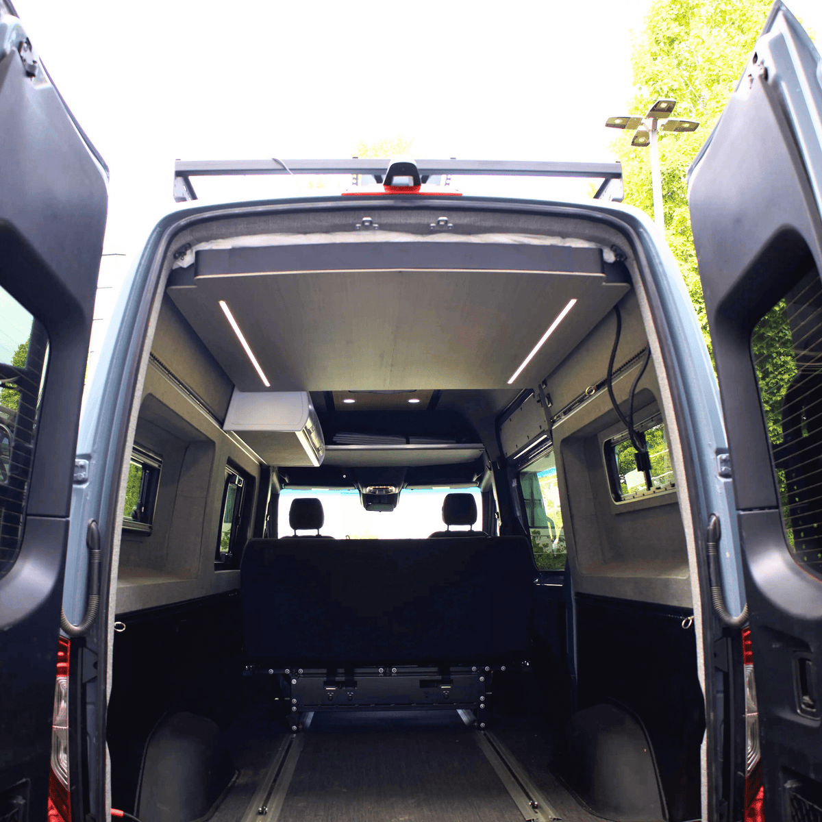 Electric lift and slide bed for Sprinter and Transit vans