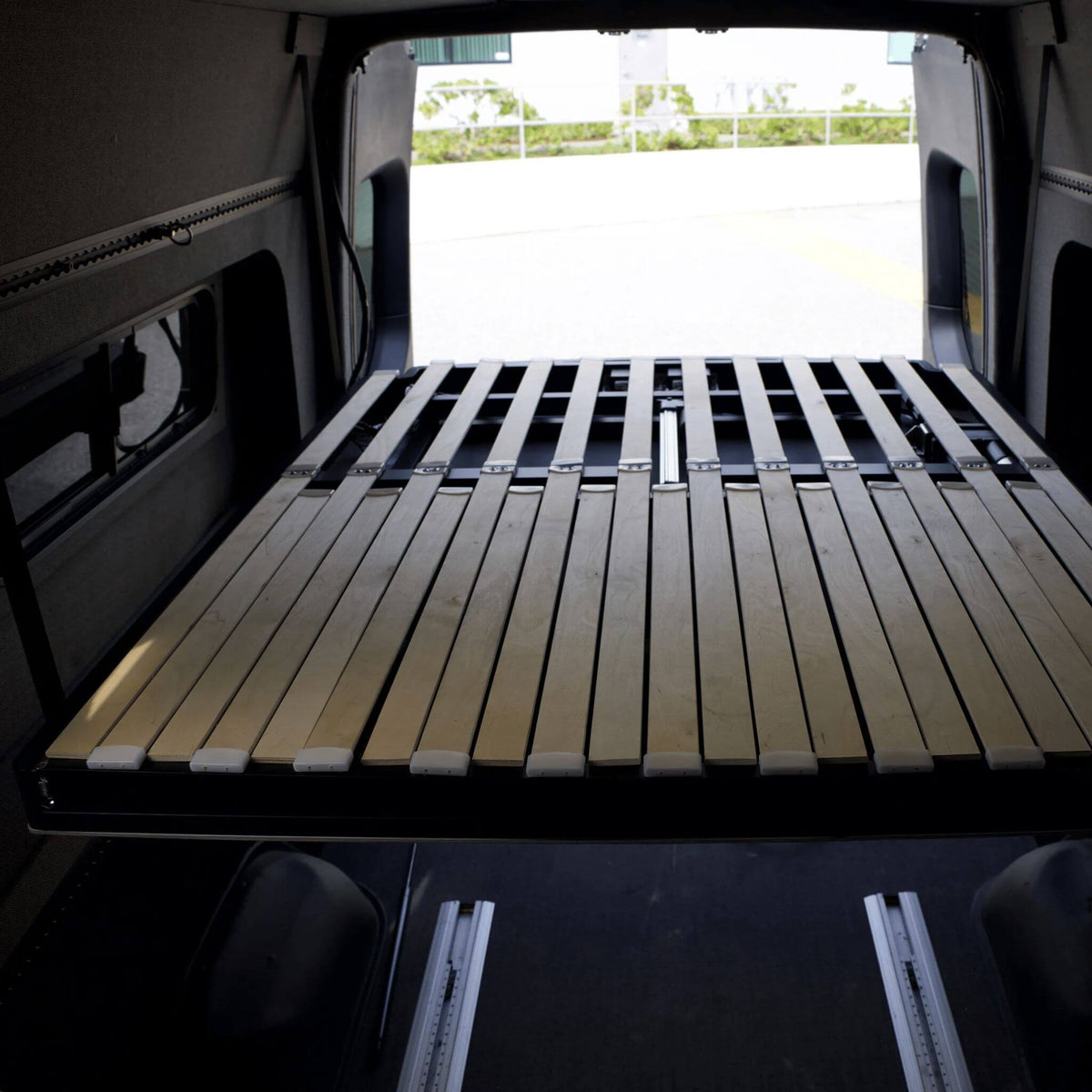 Expandable camper van bed for conversion companies and upfitters