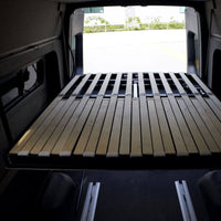 Expandable camper van bed for conversion companies and upfitters
