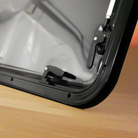 Interior view of flat window 300×700 mm with reflective blackout blind, perfect for camper vans, RVs, and trailers, providing privacy, light control, insulation, and improved comfort during travel.