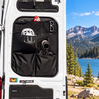 Ford Transit rear door organizers designed to keep clothing, accessories and outdoor equipment organized during vanlife adventures.