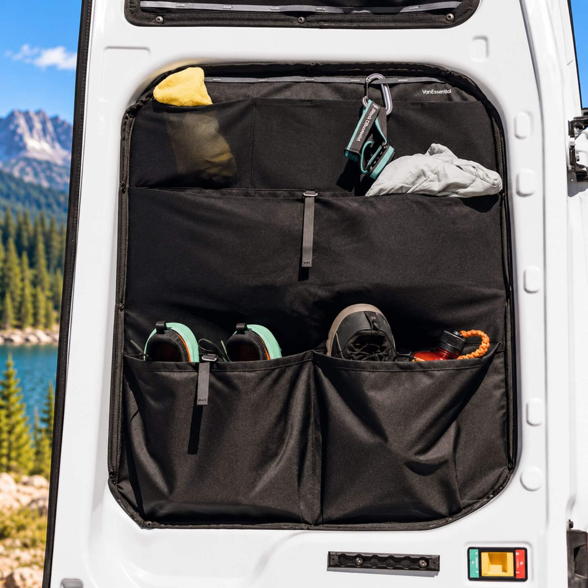 Pair of Ford Transit rear door storage panels with durable black pockets for practical van conversion organization.