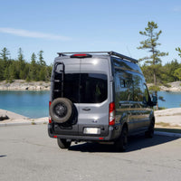 Ford Transit rear mounted spare tire carrier with integrated roof access ladder