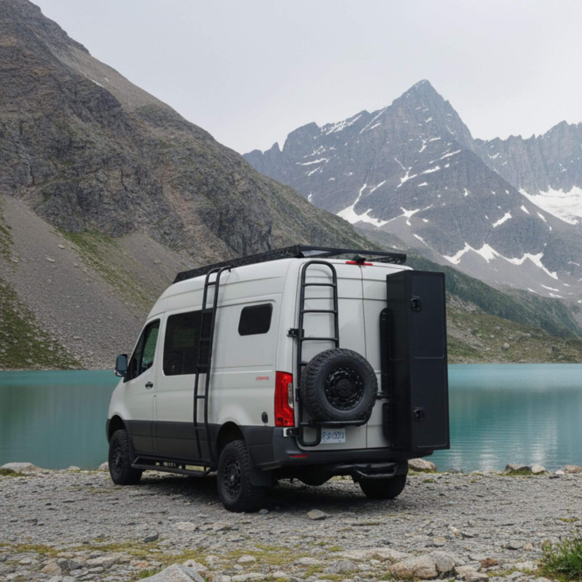 Sprinter van equipped with aluminum running boards in an open outdoor landscape