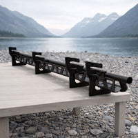 Aluminum running boards with drop-down step on Sprinter van in nature