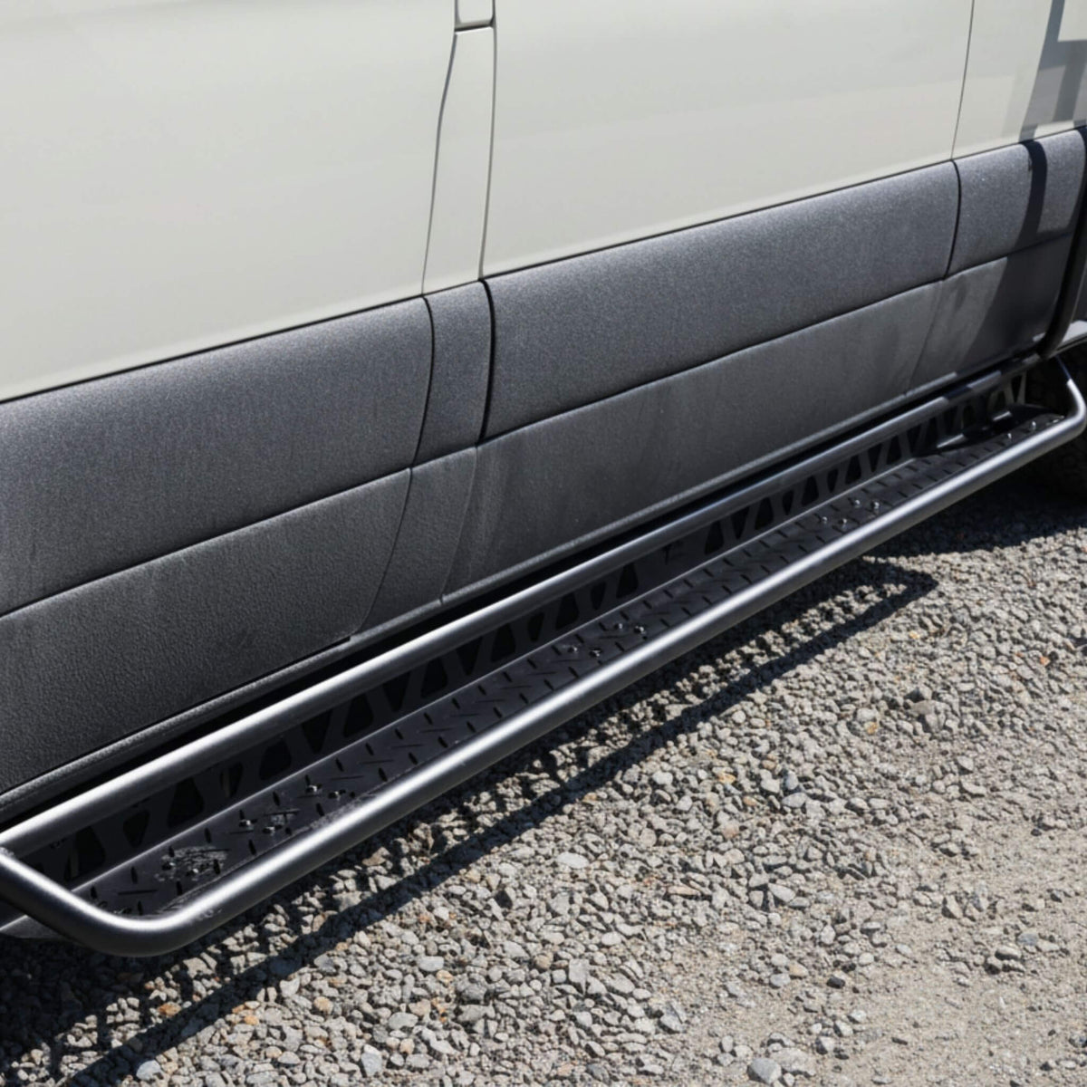 Drop-down aluminum step on Sprinter van during a calm van trip