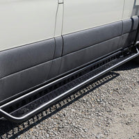 Drop-down aluminum step on Sprinter van during a calm van trip