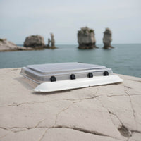 Camper roof skylight with motorized hatch and integrated ventilation system