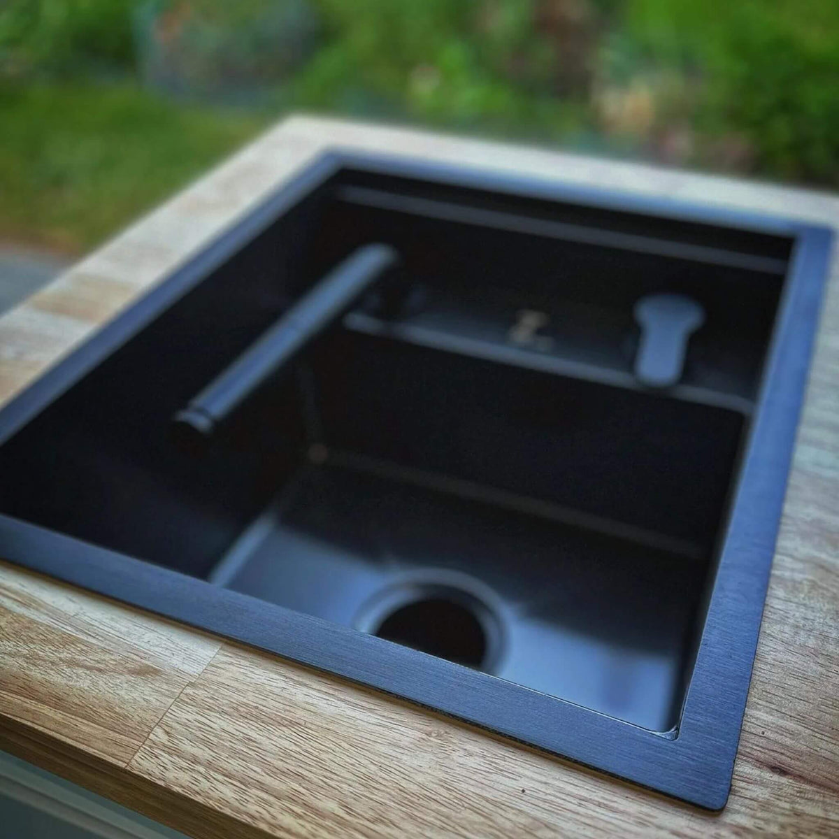 Nanotech sink for camper van plumbing system with wood cover
