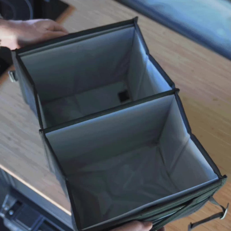 VanEssential collapsible storage box for organizing gear in a van.