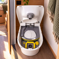 Separett Tiny waterless toilet showing rear ventilation and electrical connections for van installations.
