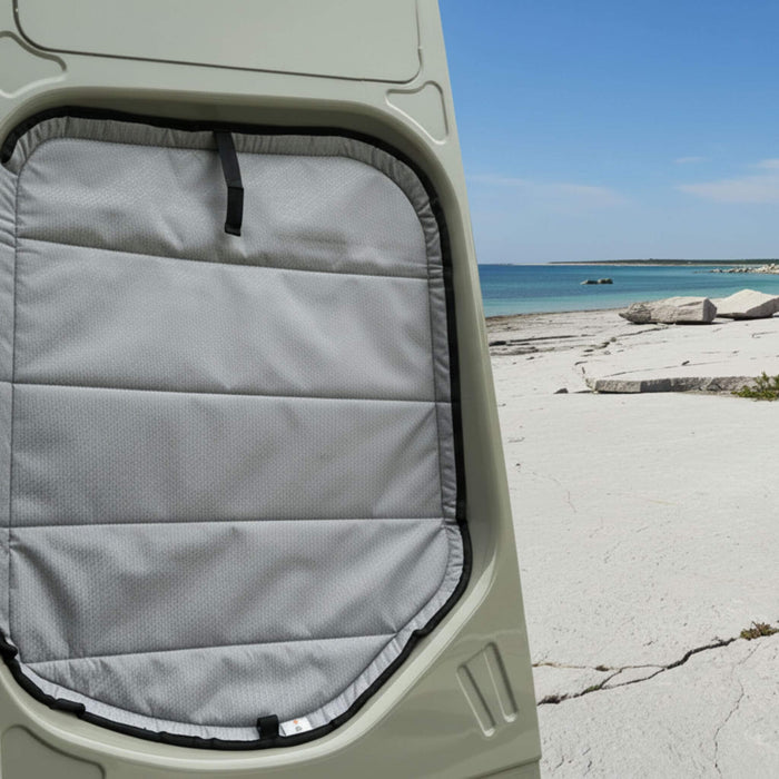 Insulated magnetic 7-piece window cover set installed inside a 2019+ Sprinter van for improved thermal performance.