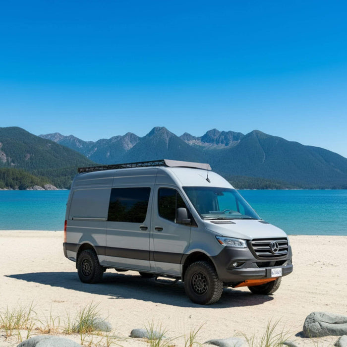 Sprinter van conversion roof rack system installed for vanlife build with gear mounting and modular layout