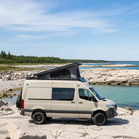 Sprinter carbon fiber rooftop tent installed for van conversion focused on freedom and mobility