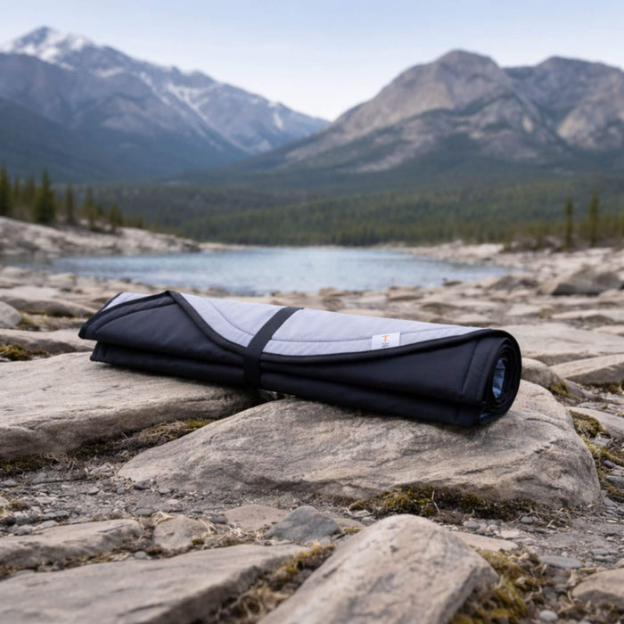 Insulated magnetic window covers installed inside a Ford Transit van, providing full interior window coverage for thermal comfort and privacy.