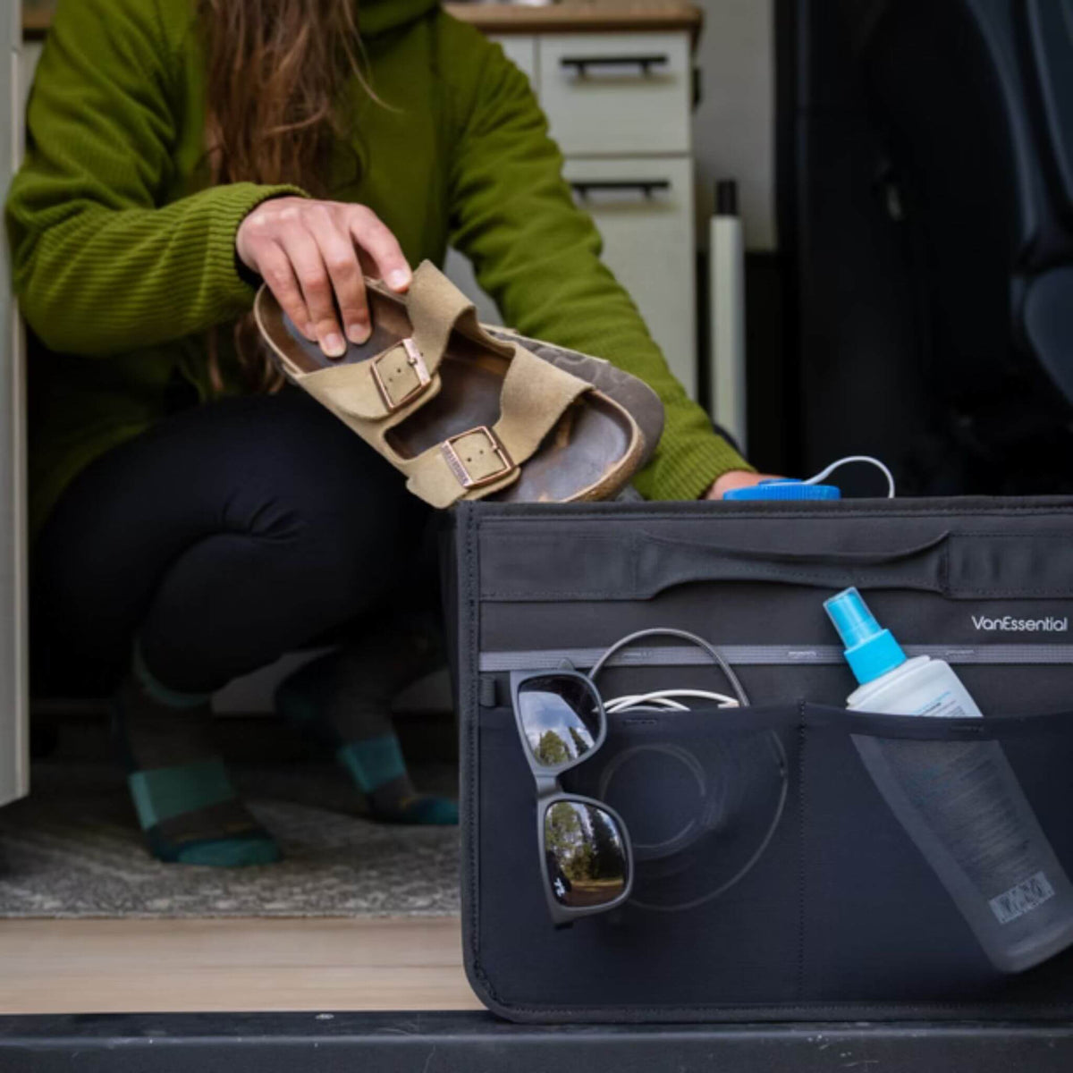 VanEssential 18 L collapsible storage box with external mesh pockets for quick-grab items.