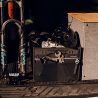 Boîte de rangement pliable VanEssential 44 L pour l'équipement de vélo et les outils, avec pochettes extérieures en filet.