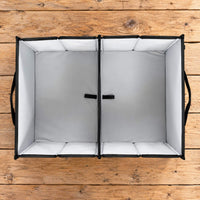 Vue du dessus de la boîte de rangement pliable VanEssential 44 L avec son séparateur amovible.