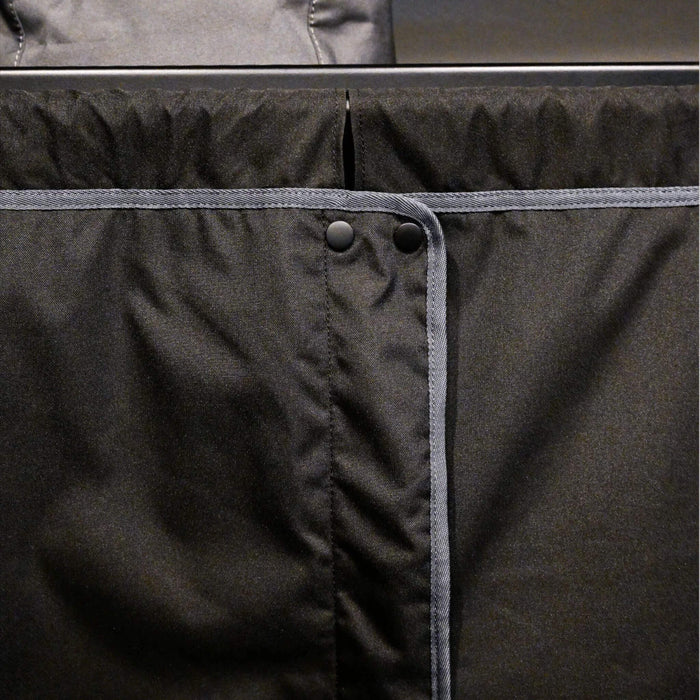 VanEssential Ford Transit insulated cab curtain with magnetic closure and snap buttons.