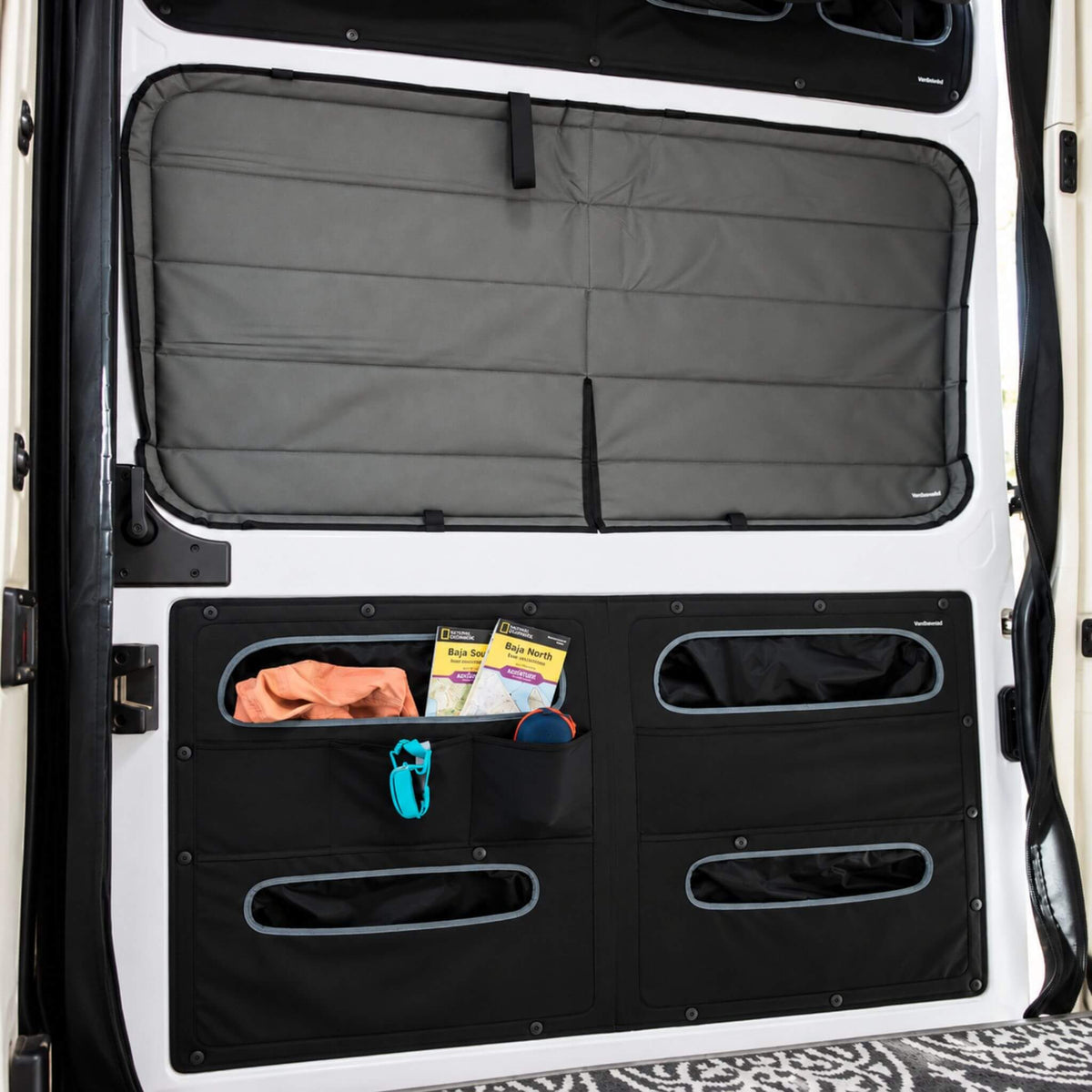 VanEssential Ram ProMaster lower sliding door storage panel for van builders.