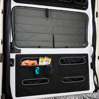 VanEssential Ram ProMaster lower sliding door storage panel for van builders.