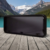 Awning style camper van window with mesh insect screen