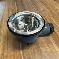 Vanlife sink installed in countertop for plumbing system